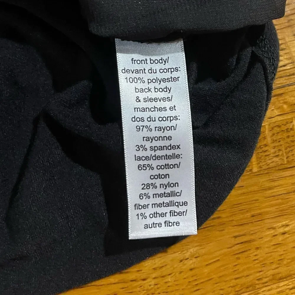 Maurices Woman’s Black and Silver Top Size 4X NWOT